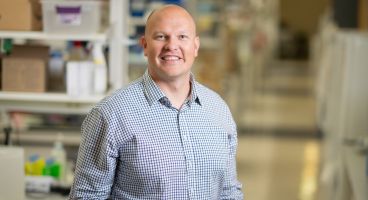 Dr. Christopher Sundberg in his lab.