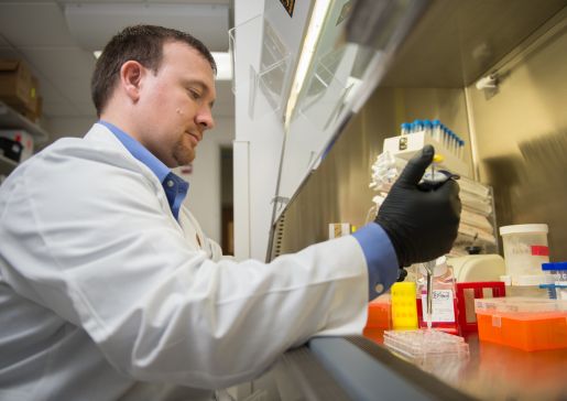 Dr. Dustin Deming in research laboratory
