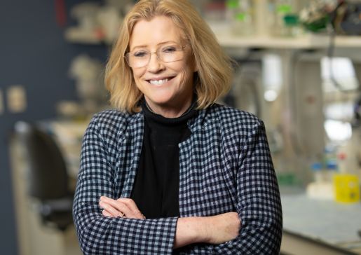 Dr. Shannon Kenney stands in her lab