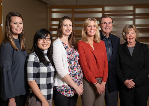 Residents Johanna Poterala, MD, Jennifer Li, MD, and Rachell Ayers, MD, are pictured with Ann Sheehy, MD, MS, and her parents Gregory Sheehy, MD, and Barbara Sheehy.