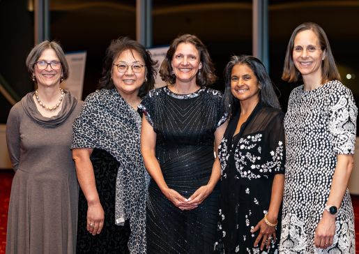Dr. Wetterneck, center, celebrates with her General Internal Medicine faculty colleagues (left to right) Elizabeth Trowbridge, MD, Kenneth D. Skaar, MD, Chair of Primary Care and chief; Mary Pak, MD, clinical professor; Shobhina Chheda, MD, MPH, professor; and Kathryn Miller, MD, associate professor