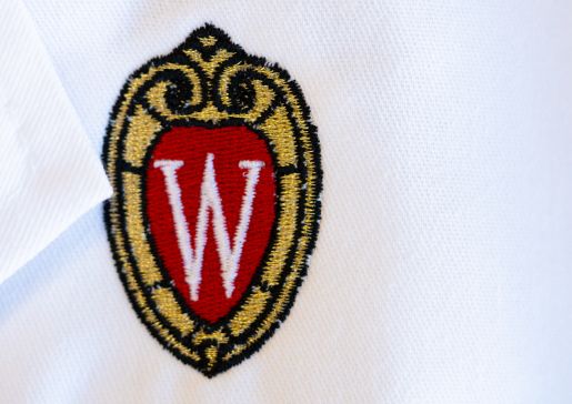 White coat with embroidered UW–Madison crest
